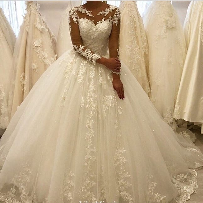 Bateau Long Sleeves A-Line Wedding Dress With Appliques Lace Ruffles Tulle