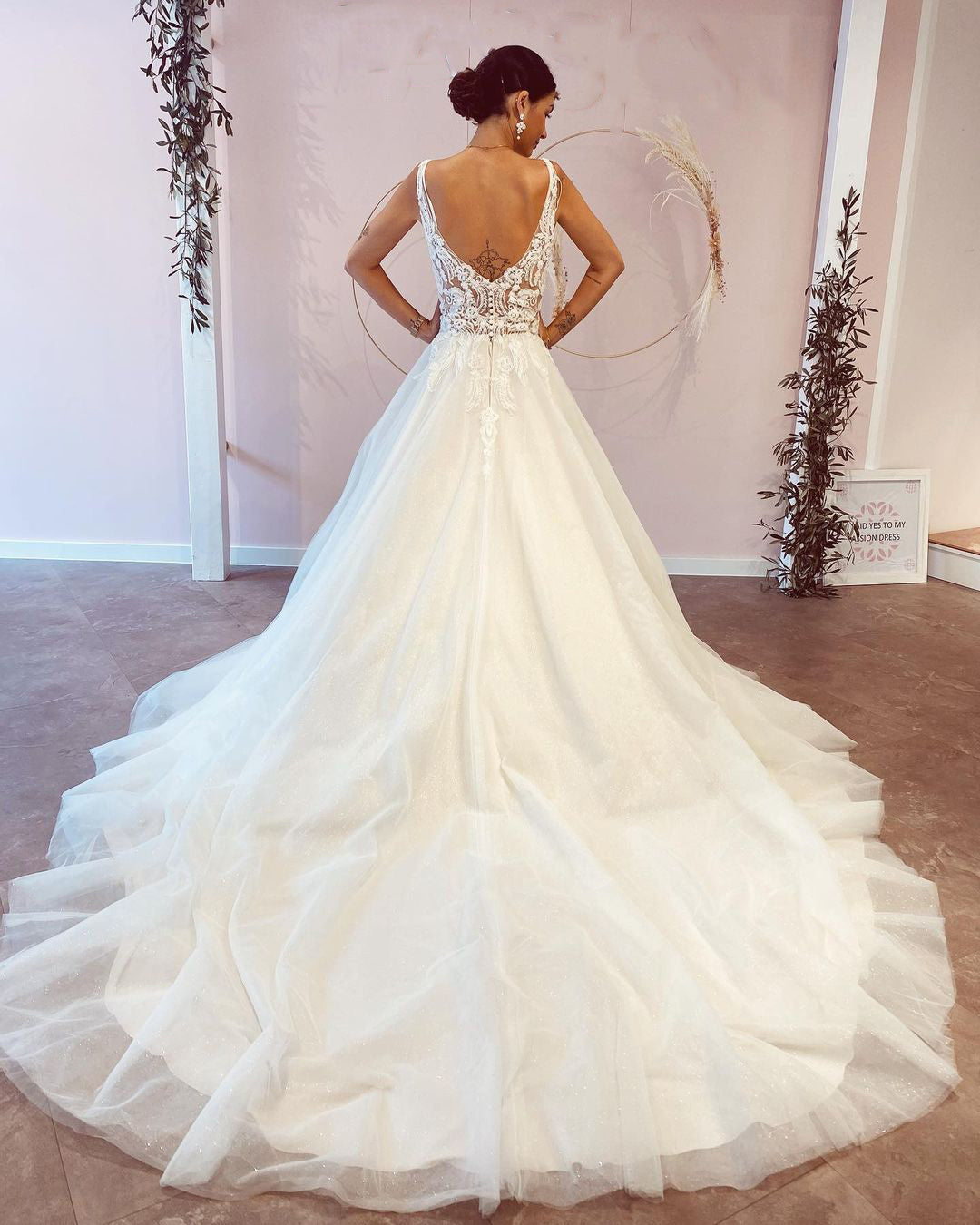 Elegant A-Line Deep V-Neck Backless Wedding Dress with Lace Appliques