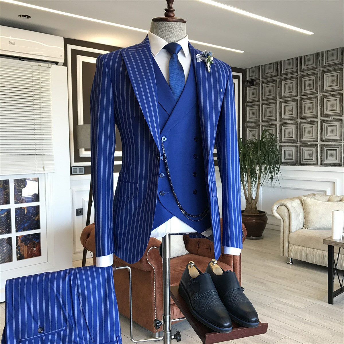 Gentle Blue Three-Piece Bespoke Suit with Peaked Lapel and Stripes