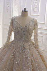 Long Sleeve V-Neck Ball Gown Wedding Dress with Sequins, Beading, and Ruffles