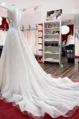 Sleeveless Jewel Neck Long A-Line Tulle Wedding Dress with Ruffles and Lace Appliques