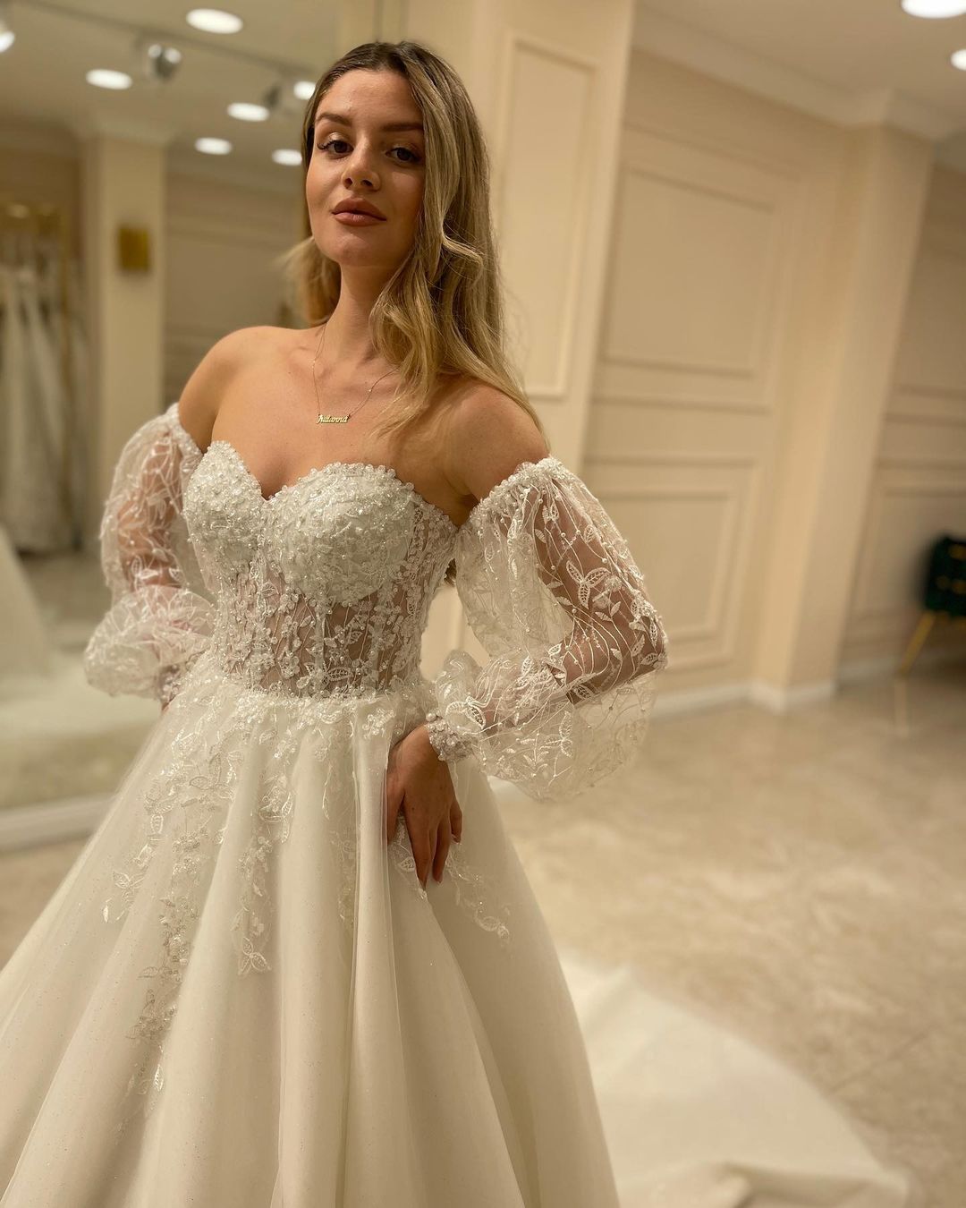Sweetheart Long Sleeve Backless A-Line Train Wedding Dress with Lace Appliques