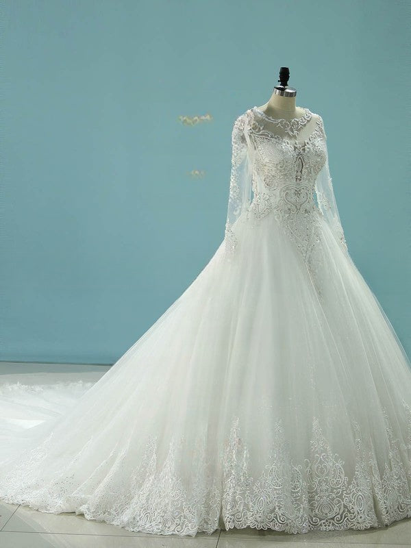 Ball Gown Illusion Tulle Chapel Train Wedding Dress With Beading