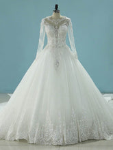 Ball Gown Illusion Tulle Chapel Train Wedding Dress With Beading