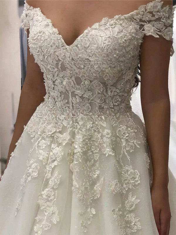 Elegant Off-the-shoulder Tulle Court Train Wedding Dress with Beading