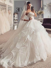 Gorgeous Ball Gown Sweetheart Tulle Wedding Dress with Cascading Ruffles and Sweep Train