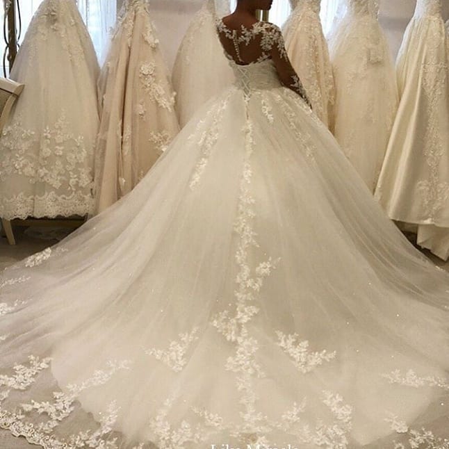 Bateau Long Sleeves A-Line Wedding Dress With Appliques Lace Ruffles Tulle