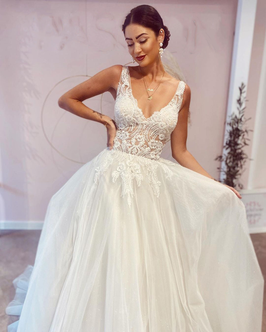 Elegant A-Line Deep V-Neck Backless Wedding Dress with Lace Appliques